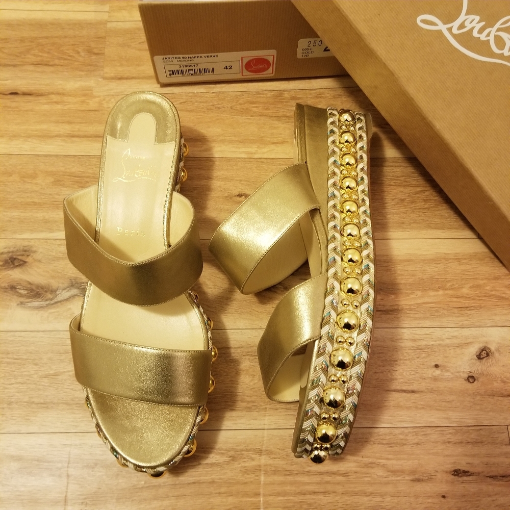 Christian Louboutin Janitag. One stud came off in the back of one shoe.